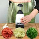 Triturador manual de alimentos com lâminas rotativas